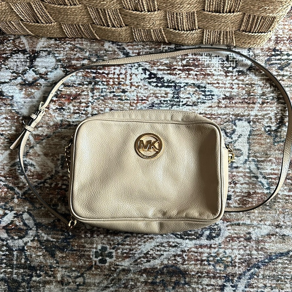 Michael Kors cream/tan crossbody purse.